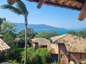 Casa em condomínio com lazer perto da praia